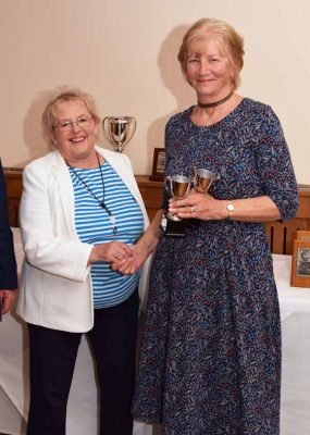 Trish Newey-King receives one of the four trophies she won